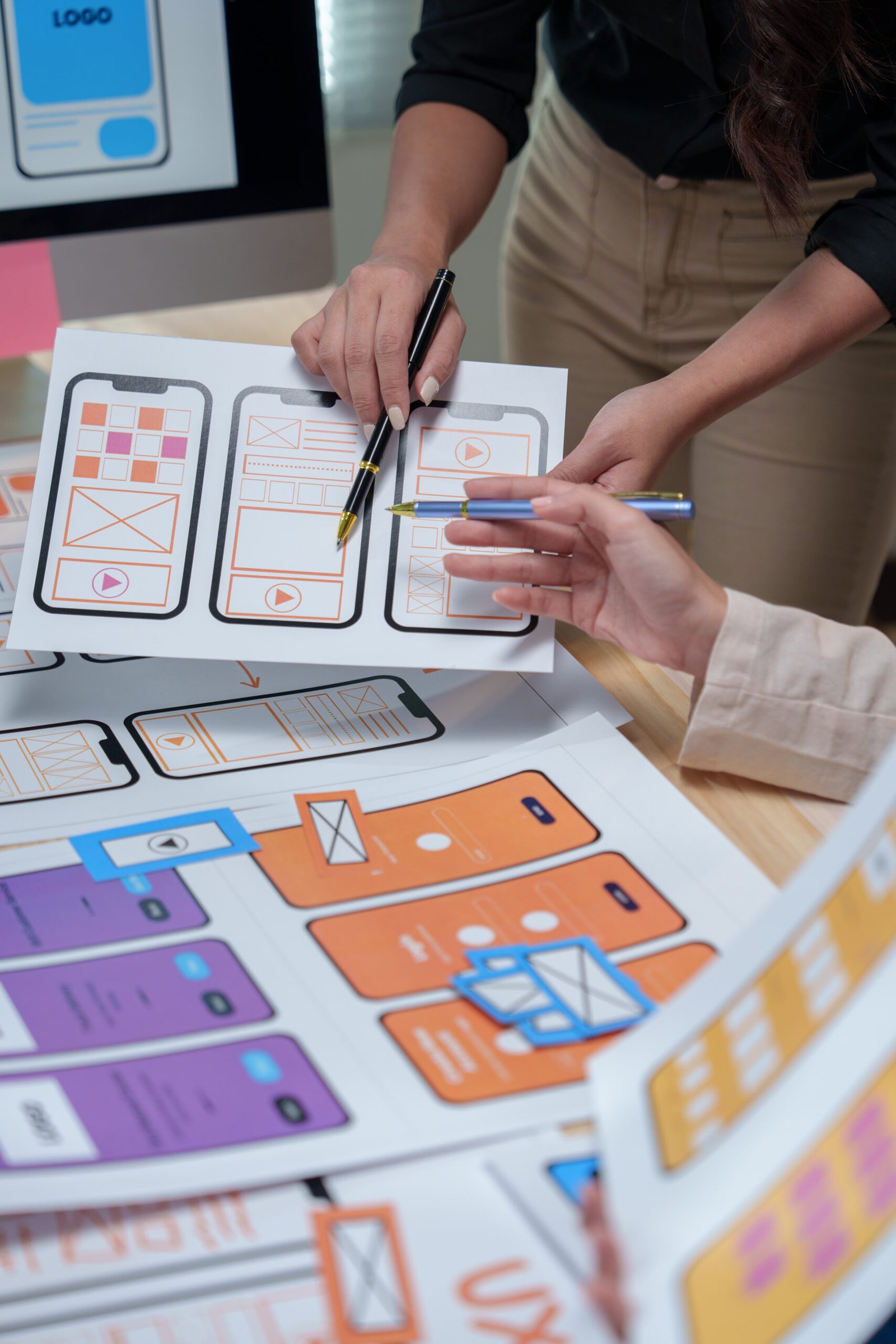 ui ux designers are discussing mobile app template 2025 02 20 03 55 54 utc scaled